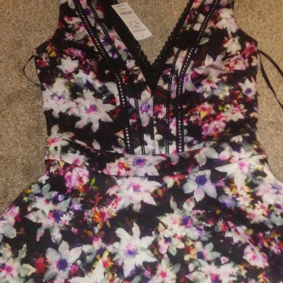 Bebe Floral Peplum Top Blouse size S - Picture 9 of 10